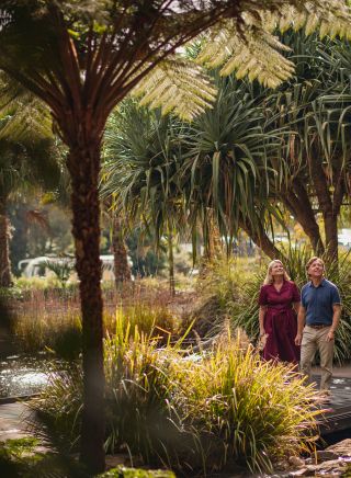 Couple walking in The Australian Botanic Garden in Mount Annan, NSW